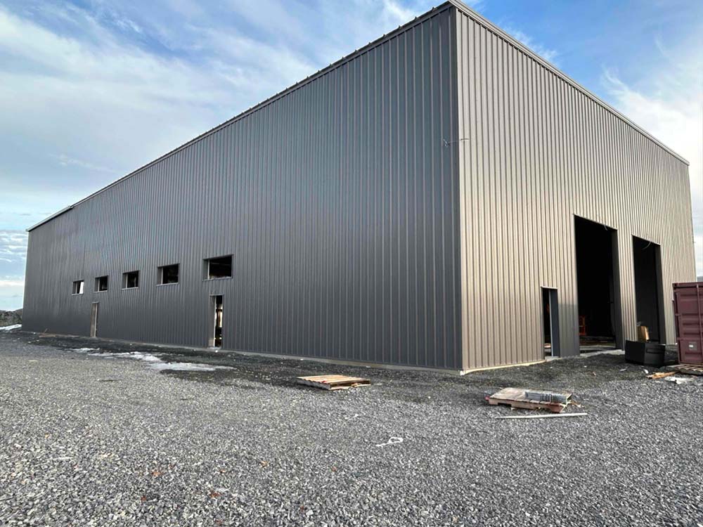 exterior of a ridget frame building being installed
